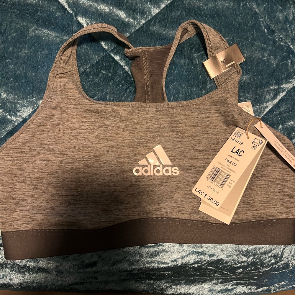 Brand new with tags. Adidas sports bra size Large. Open to reasonable offers